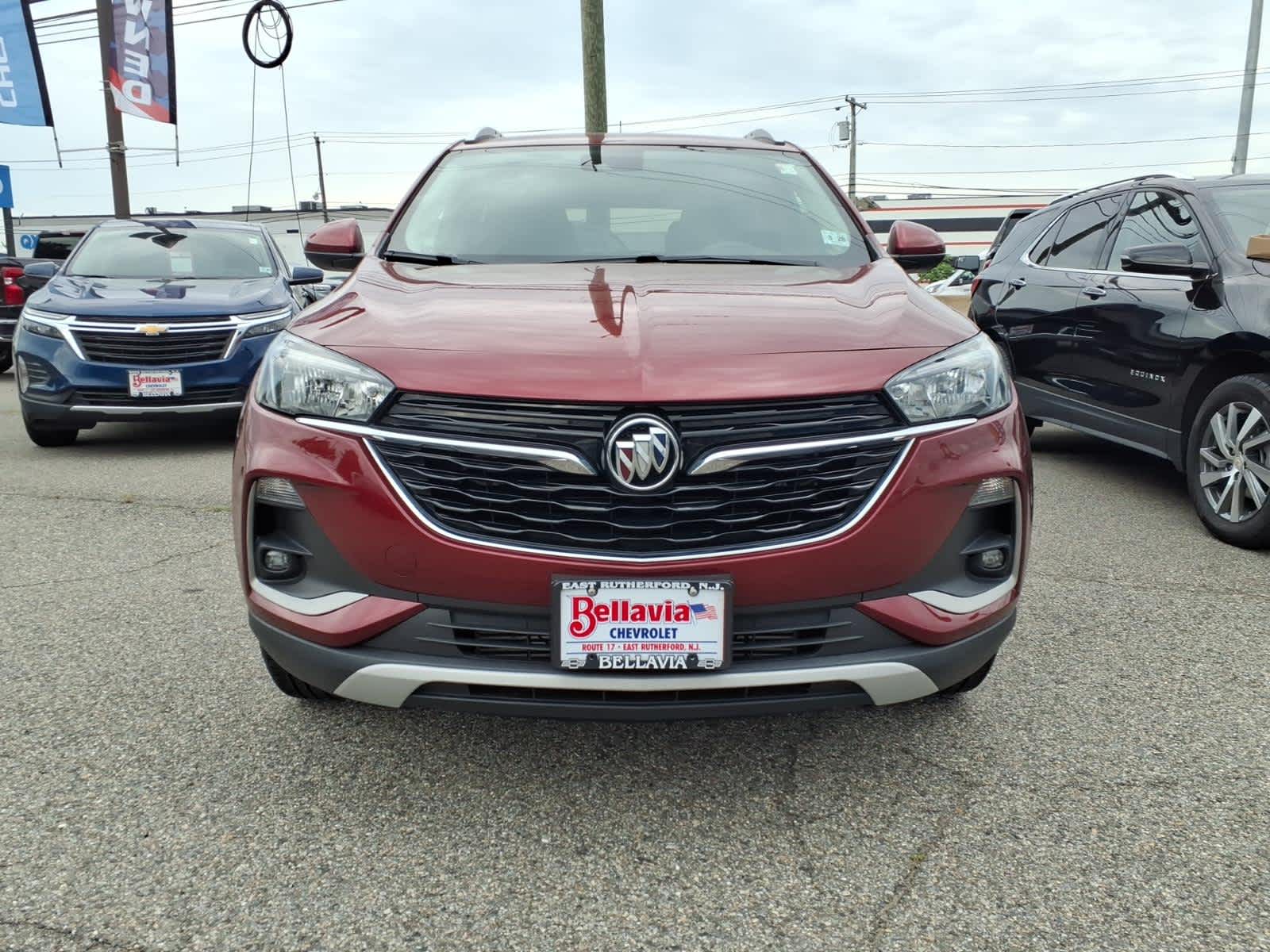 2023 Buick Encore GX Select in Cinnabar Metallic — front three-quarter view