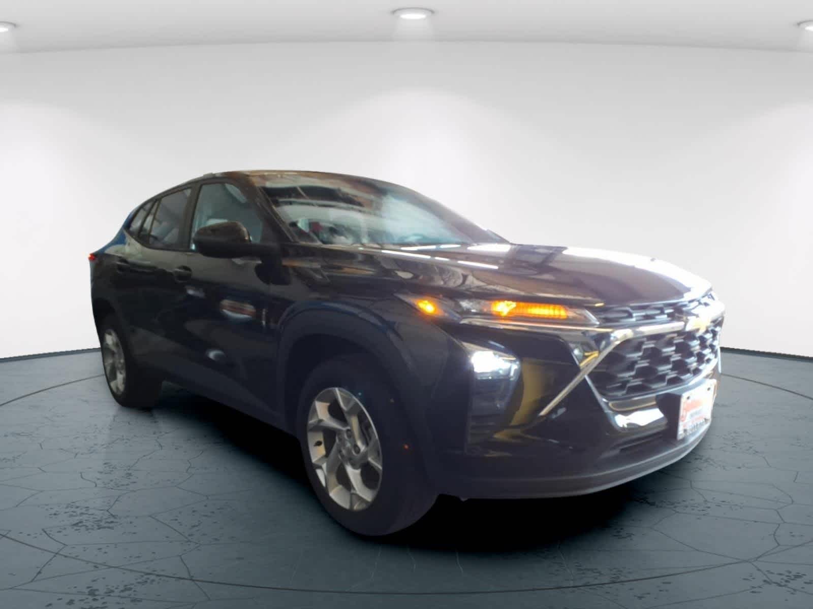 2024 Chevrolet Trax LS in Mosaic Black Metallic — front three-quarter view